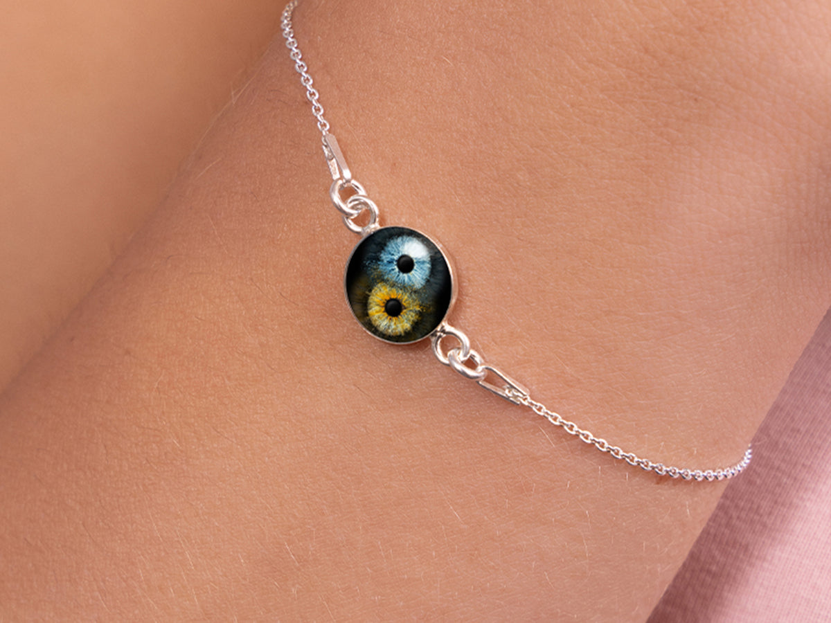 Eyepixx Armband in silber mit Fusionsbild zweier Iriden als Motiv