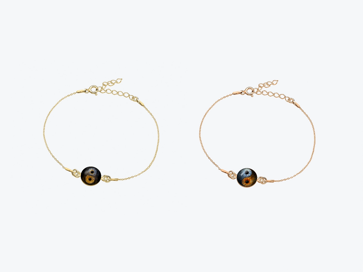 Armbänder in gold und rosegold mit Irisfotografien als Fusion und YinYang